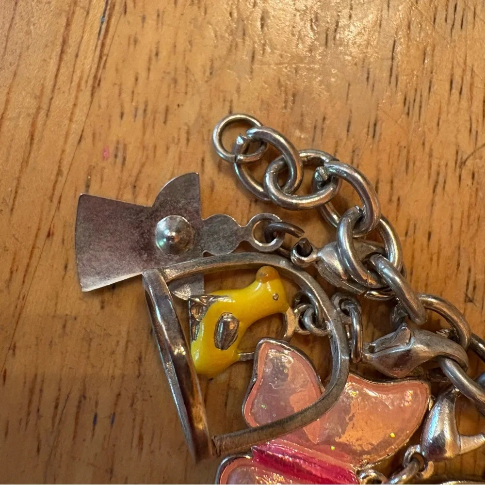 Claires silver charm